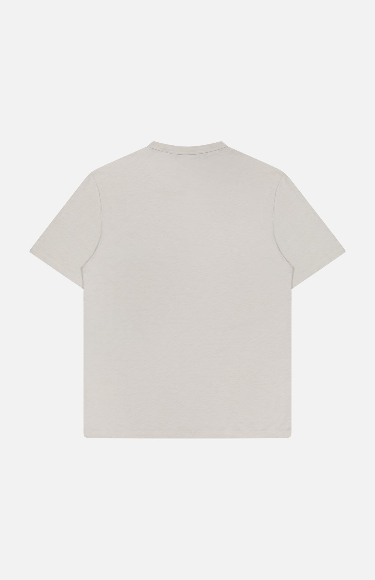 The THEORY Essential Cosmo T-shirt, crafted in Peru from soft organic cotton jersey in light beige, is displayed flat with a back view against a white background.