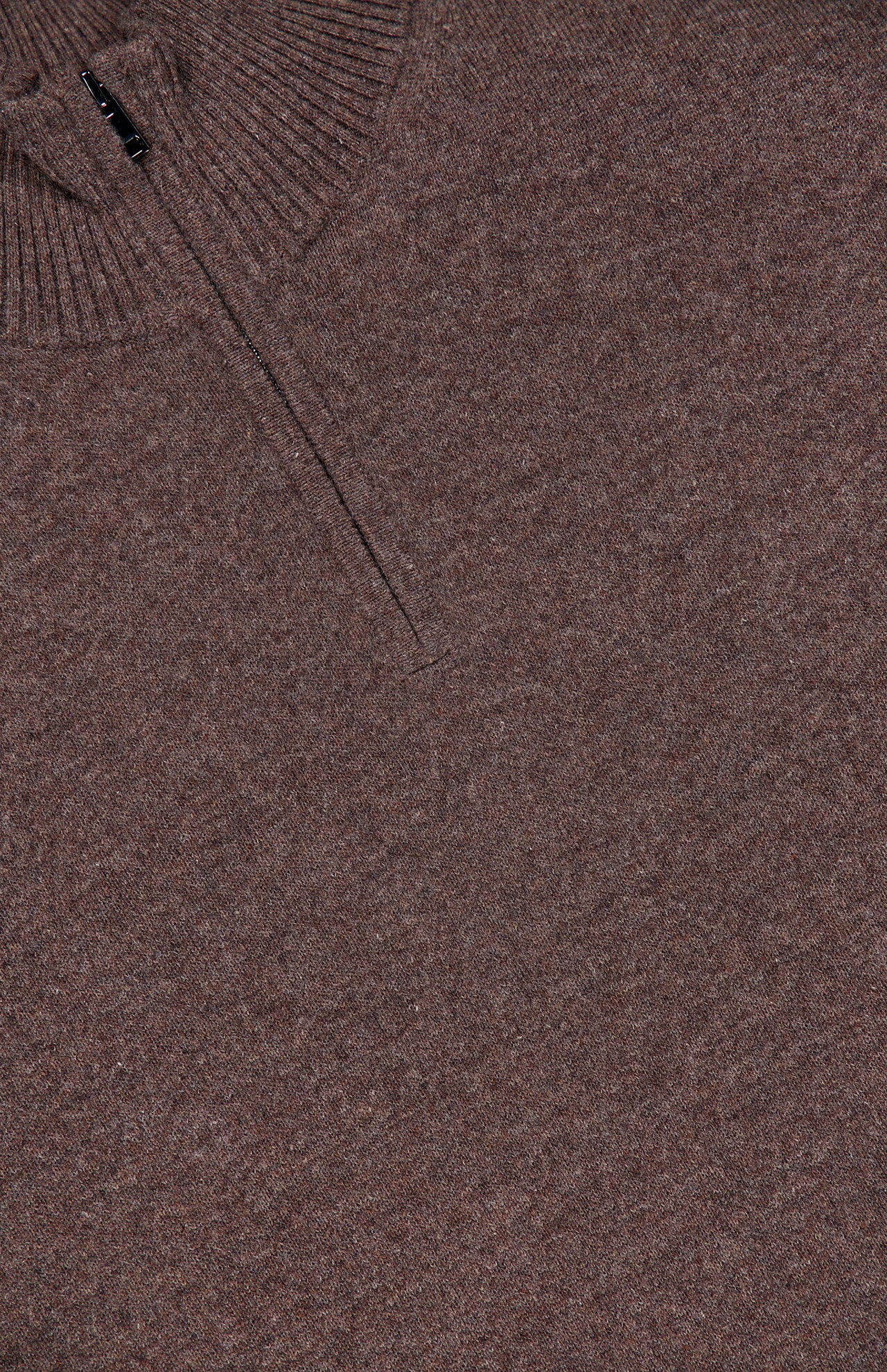 Close-up of the Hilles Cashmere Quarter Zip Sweater by THEORY, a men’s brown sweater crafted from luxurious cashmere, featuring a ribbed collar and a partial zipper at the neckline—exemplifying the refined style of this classic quarter-zip design.