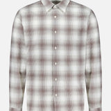 The THEORY Irving Faded Plaid Shirt is a long-sleeve, button-up vintage cotton shirt featuring a brown and white plaid pattern, a classic collar, and white buttons, displayed on a plain white background.