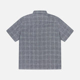 Back view of the THEORY Irving Short Sleeve Relaxed Shirt, featuring a relaxed fit and subtle blue and gray plaid pattern, laid flat on a white background.
