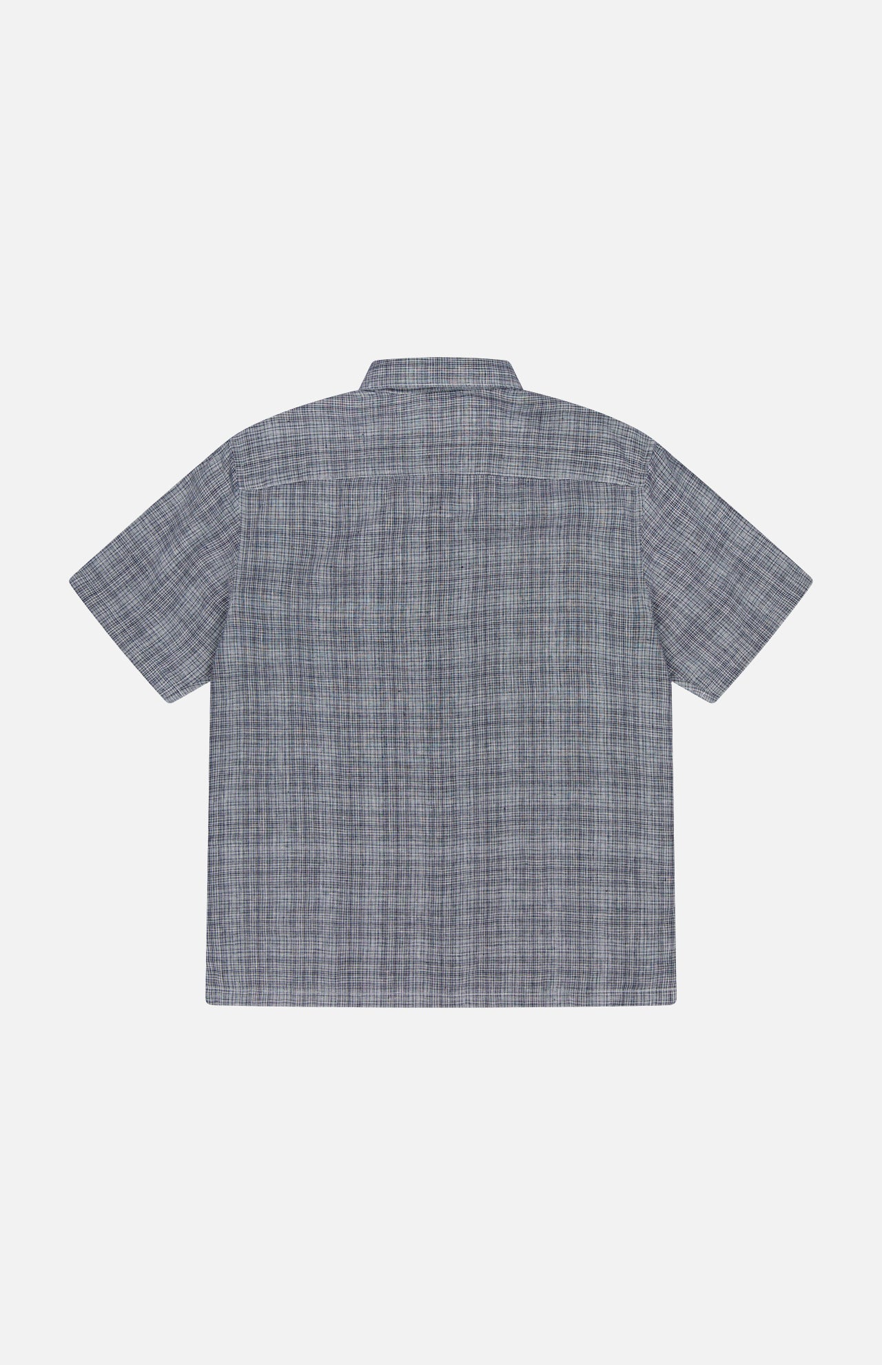 Back view of the THEORY Irving Short Sleeve Relaxed Shirt, featuring a relaxed fit and subtle blue and gray plaid pattern, laid flat on a white background.