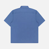 THEORY's Irving Short Sleeve Structure Shirt in cornflower blue, shown flat from the back, features a classic collar, straight hem, and short sleeves.