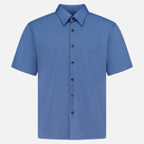 The THEORY Irving Short Sleeve Structure Shirt is a wrinkle-free, solid cornflower blue button-up with a classic collar and dark front buttons, shown on a plain white background.