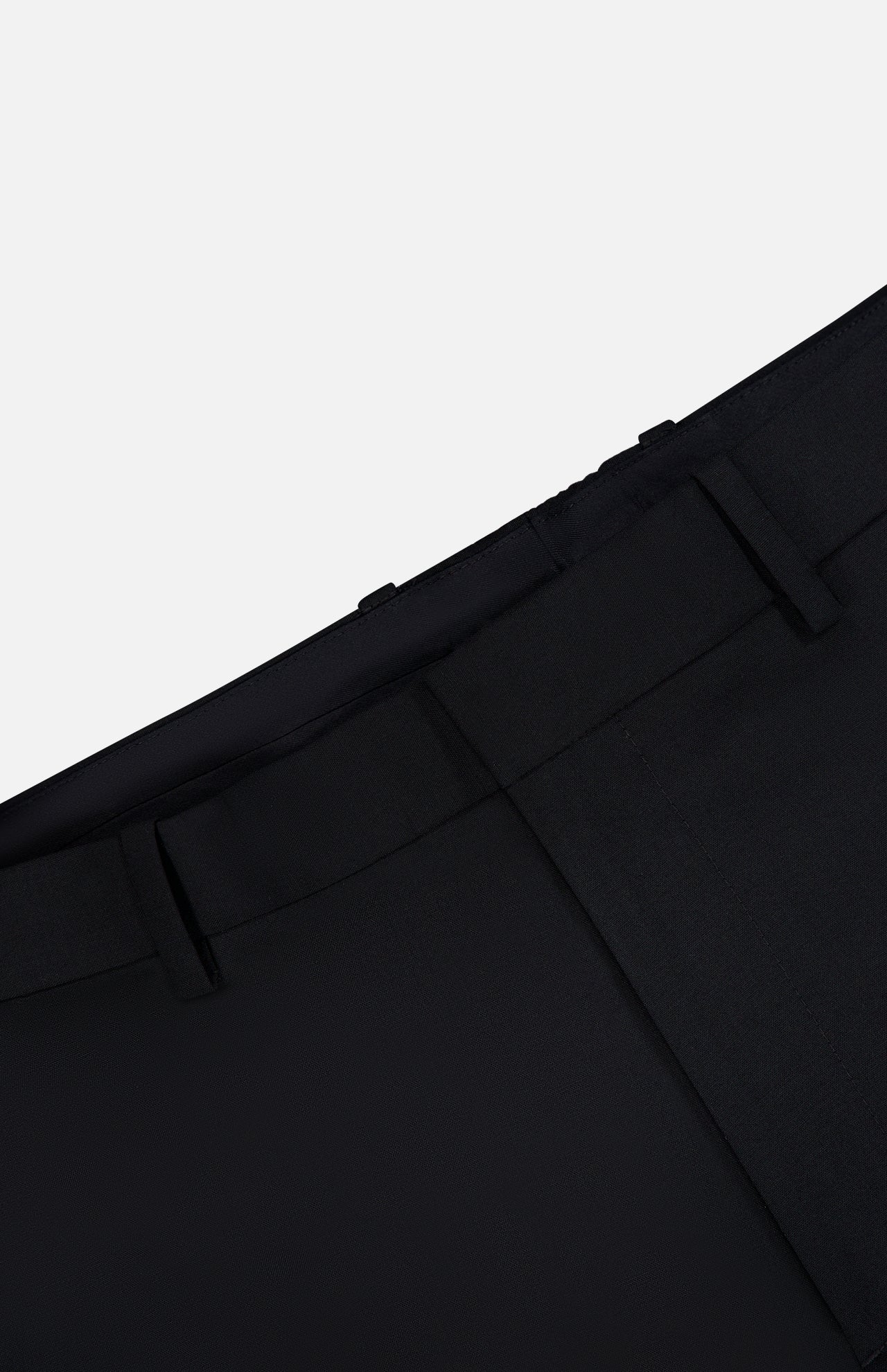 Close-up of the waistband and upper section of the THEORY Mayer Pant in Stretch Wool, showcasing expertly crafted Italian wool suiting with belt loops and a clean, smooth finish.