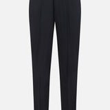The Mayer Pant in Stretch Wool by THEORY is a pair of slim-fit black trousers, expertly tailored from premium Italian wool suiting, featuring belt loops and a sharp front crease, showcased against a plain white background.