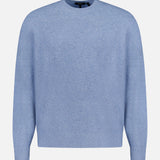 The Riland Crewneck Sweater by THEORY is shown in light blue on a plain white background. Made from a lightweight stretch knit for breathable comfort, this long-sleeve pullover features a classic crew neckline and a minimalist design with no visible patterns, logos, or embellishments.