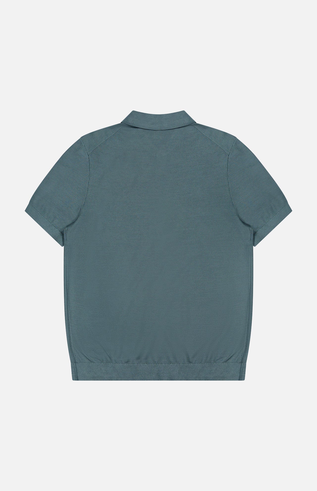 The THEORY Silk Cotton Polo Shirt in rich teal is shown from the back, laid flat on a white background, featuring a simple collar, button-front placket, and ribbed waistband.