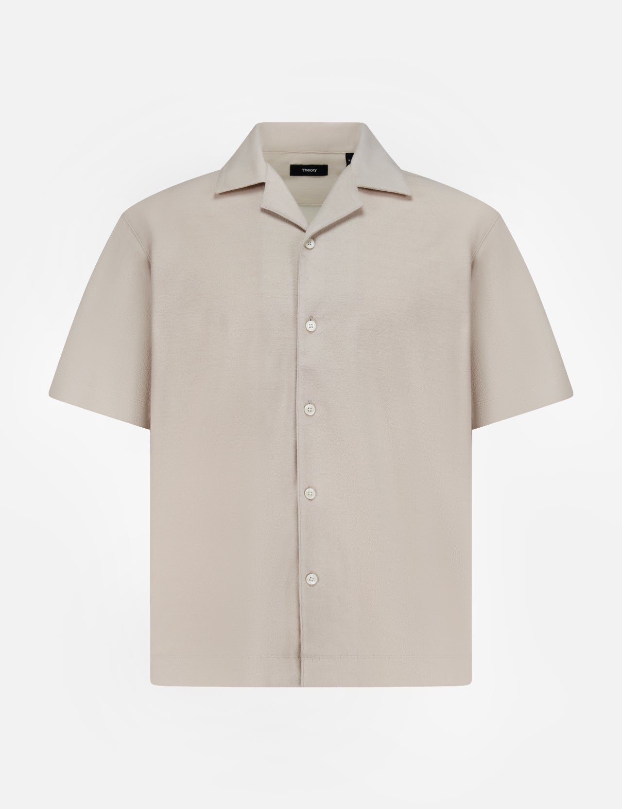 The THEORY Soft Terry Short Sleeve Shirt features a relaxed fit, notched collar, and beige cotton fabric—perfect as a casual work shirt. Displayed on a plain white background.