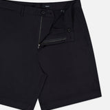 THEORY Standard Chino Moons Shorts: men's black cotton twill shorts with a minimal design, side pockets, and partially open waistband, button, and zip fly. Displayed on a white background.
