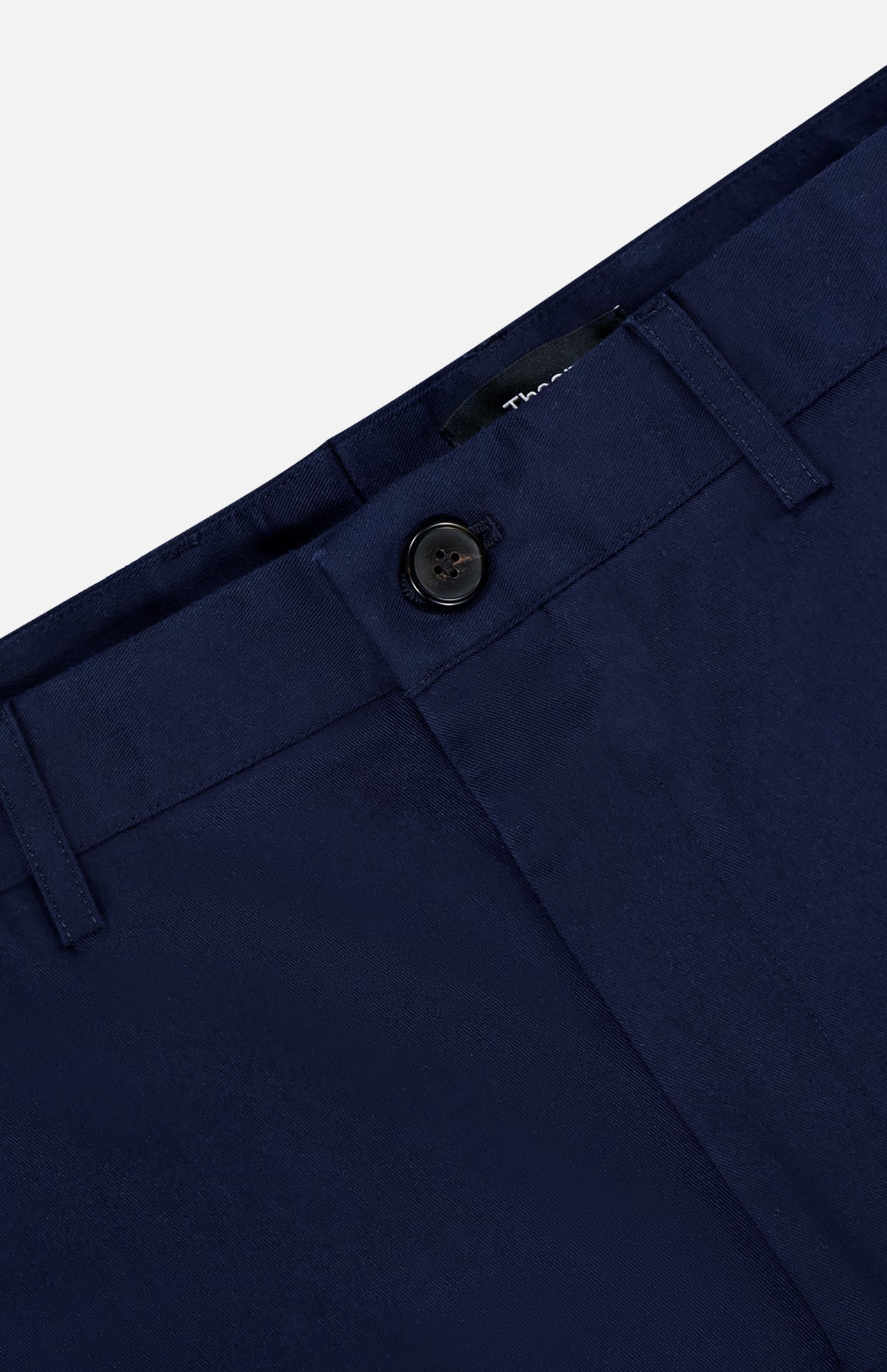 Close-up of the waistband and upper section of RAG & BONE's Standard Moons Shorts, in navy, showing a single black button closure, belt loops, and a partially visible inner label.