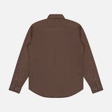 The Sylvain Structure Dress Shirt by THEORY is a chocolate brown, slim-fit style with long sleeves and a classic collar, shown from the back. It features cuff buttons and a curved hem, and its wrinkle-resistant fabric is displayed against a plain white background.