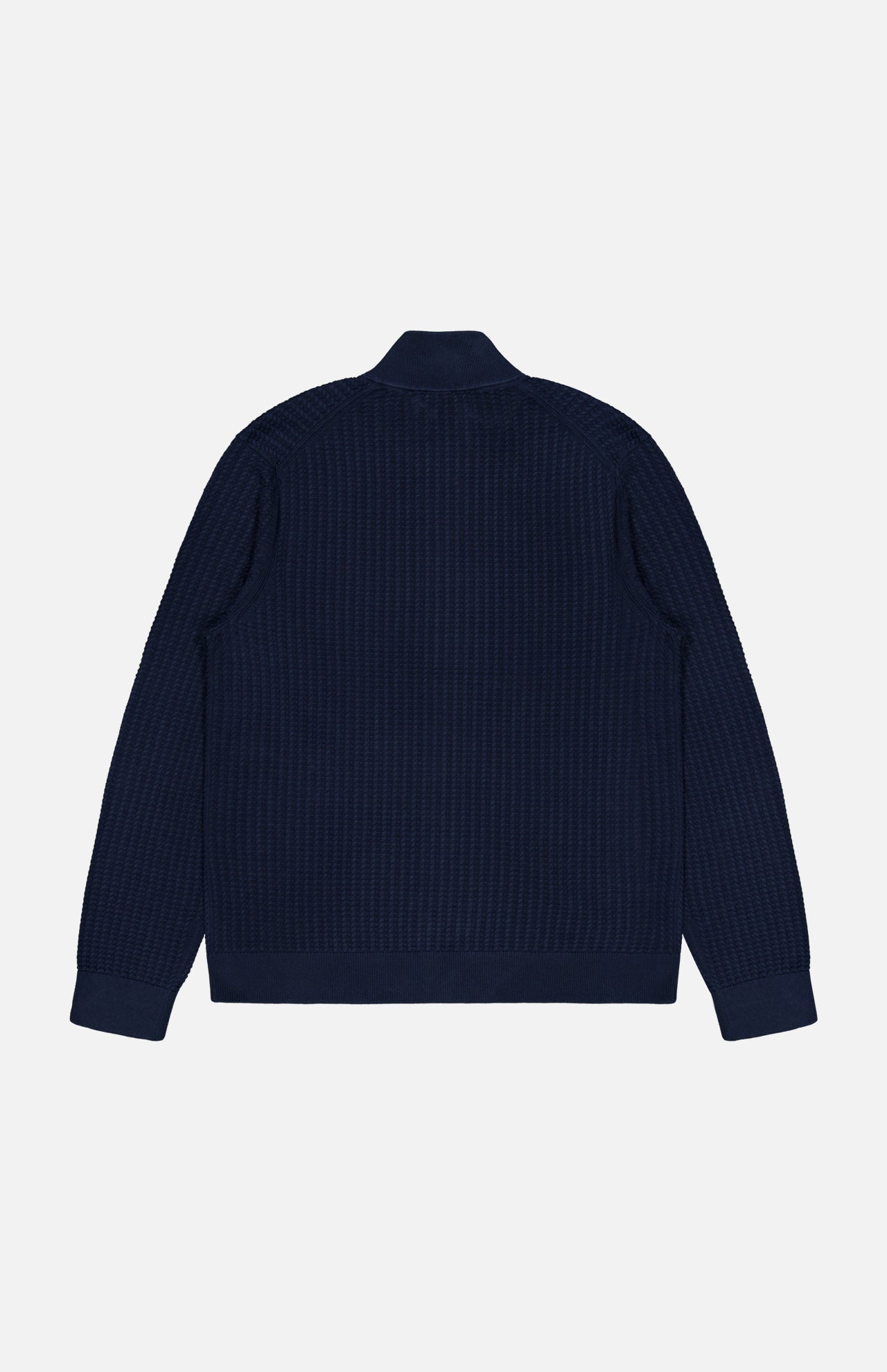 The THEORY Walton Full Zip Sweater in navy blue features long sleeves and a textured knit cotton design, shown laid flat from the back on a white background.