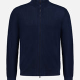 The THEORY Walton Full Zip Sweater is a navy blue, long-sleeve sweater featuring a textured knit pattern, ribbed cuffs and hem, and a mock collar. It is displayed against a plain white background.
