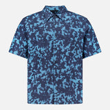 The THEORY Weekend Short Sleeve Shirt features a cotton blend, button-up design with blue and navy abstract camouflage pattern and a left chest pocket, shown on a plain white background.
