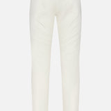 Back view of THEORY Raffi Stretch Twill Pants in an oat milk shade, slim fit with visible back pockets and belt loops, made from comfy 4-way stretch fabric, shown against a plain white background.