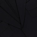 Close-up of the THEORY Relaxed Belted Blazer in black, featuring a textured fabric, lapels, collar, and two flap front pockets—a perfect choice for polished office outfits.