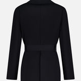 Back view of THEORY's Relaxed Belted Blazer in black, showcasing long sleeves, a structured fit, notched collar, and self-tie waist belt—ideal for polished office attire.