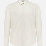 The THEORY Sylvain Slim Structure Shirt is a plain, off-white, long-sleeved slim fit dress shirt with a pointed collar, displayed against a white background.