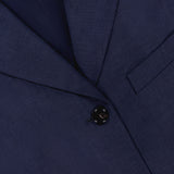 Close-up of the THEORY 3 Button Sleeveless Vest in navy, featuring three black buttons, a notched lapel, and a chest pocket—ideal for women's summer office suiting. The label inside the collar displays THEORY.