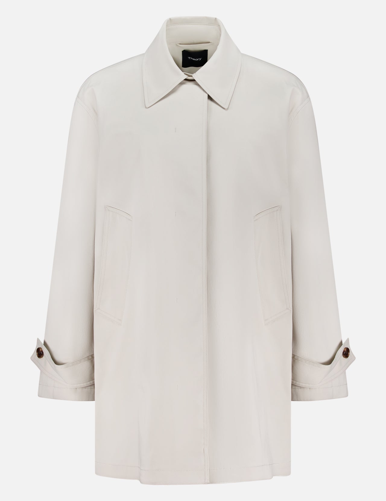 THEORY's A-Line Trench Coat is a light beige, long-sleeve style with a collar, front pockets, and buttoned cuffs. Made from stretch cotton-blend fabric, it's shown against a plain white background.