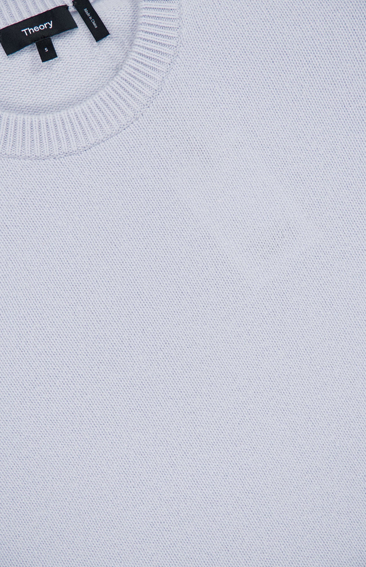 Light blue Theory Cashmere Crew Neck Sweater with a ribbed collar.