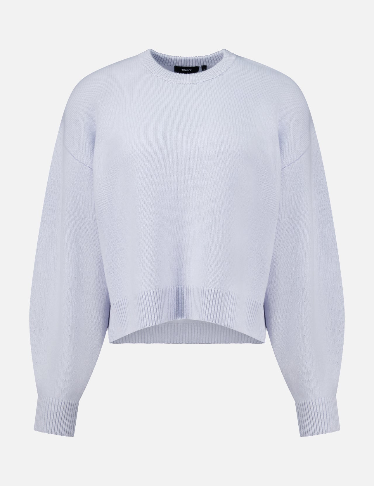Periwinkle Theory Cashmere Crew Neck Sweater with drop shoulders and a ribbed hem.