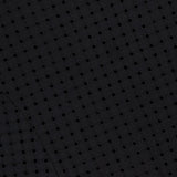 Close-up of the Easy Curve Eyelet Dress by THEORY, showcasing black eyelet fabric with a repeating circular pattern, visible stitching, and curved seam lines for a textured, slightly sheer look typical of this stylish midi dress.