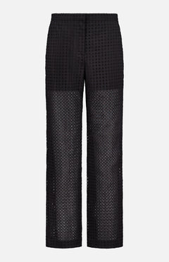 The THEORY Easy Eyelet Slim Fit Pant features black perforated, embroidered eyelet cotton with geometric cut-outs. It has a solid waistband and is partially lined to mid-thigh, leaving the lower legs sheer.