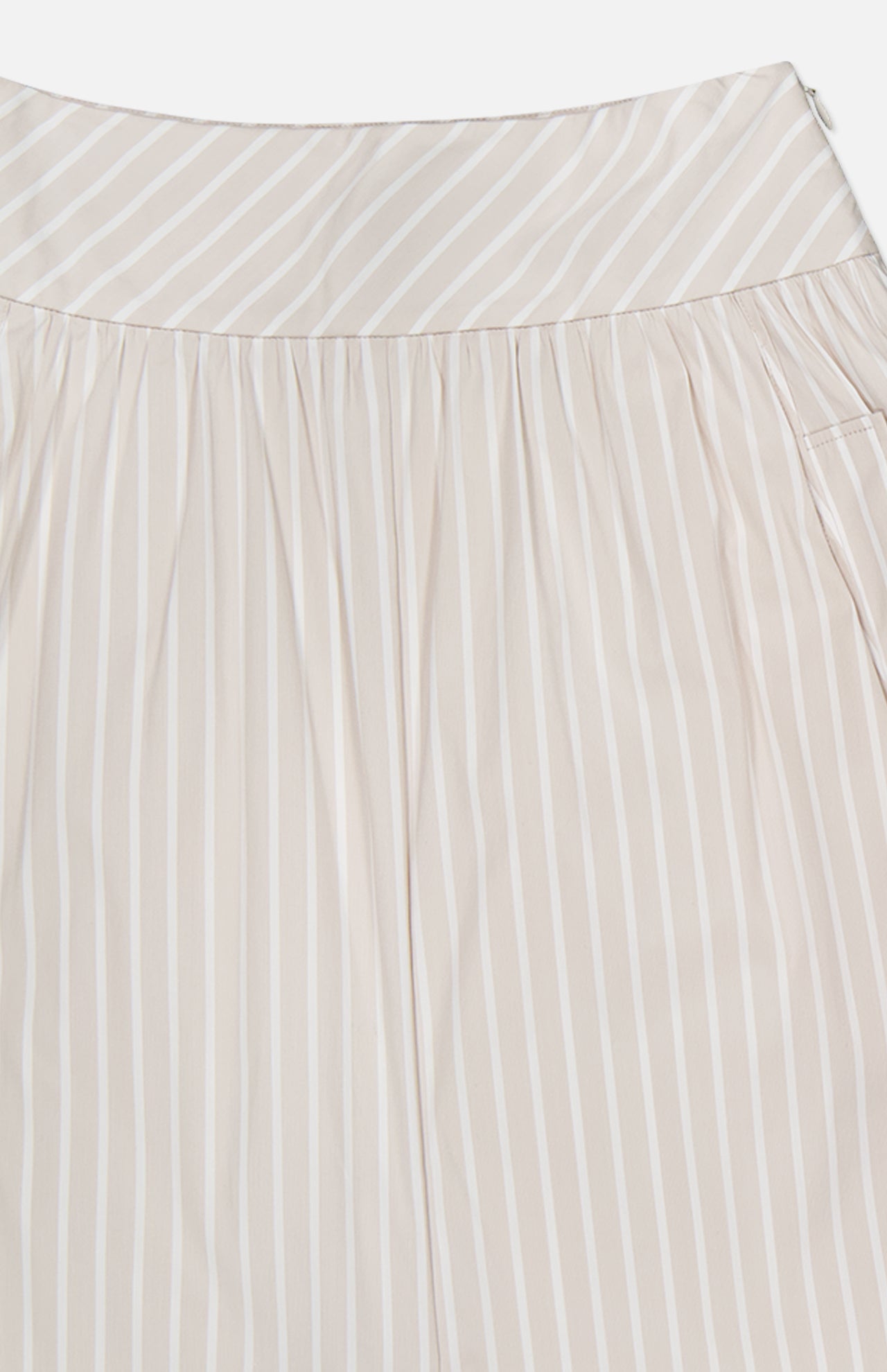 Close-up of the THEORY Front Vented Volume Striped Skirt, featuring light beige cotton-blend fabric with vertical neutral stripes, a gathered waistband, and a clean, tailored design.