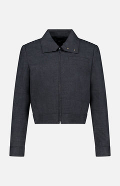 THEORY’s Harrington Cropped Jacket is a women’s dark gray, long-sleeve charcoal jacket featuring a modern cropped fit, front zipper closure, pointed collar with snap button details, and straight cuffs. Crafted from a wool-blend fabric, this versatile office-ready jacket delivers stylish sophistication for any wardrobe.