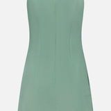 The THEORY Linen Apron Mini Dress is a sleeveless sage green mini with thin straps, straight neckline, subtle seams, hidden back zipper, fitted linen-blend silhouette, and a small slit for effortless summer style.