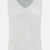 The THEORY Merino Slim Tank Top is a sleeveless white piece with a relaxed V-neck fit, made from smooth, lightweight Merino wool and showcases a simple, minimalist design.
