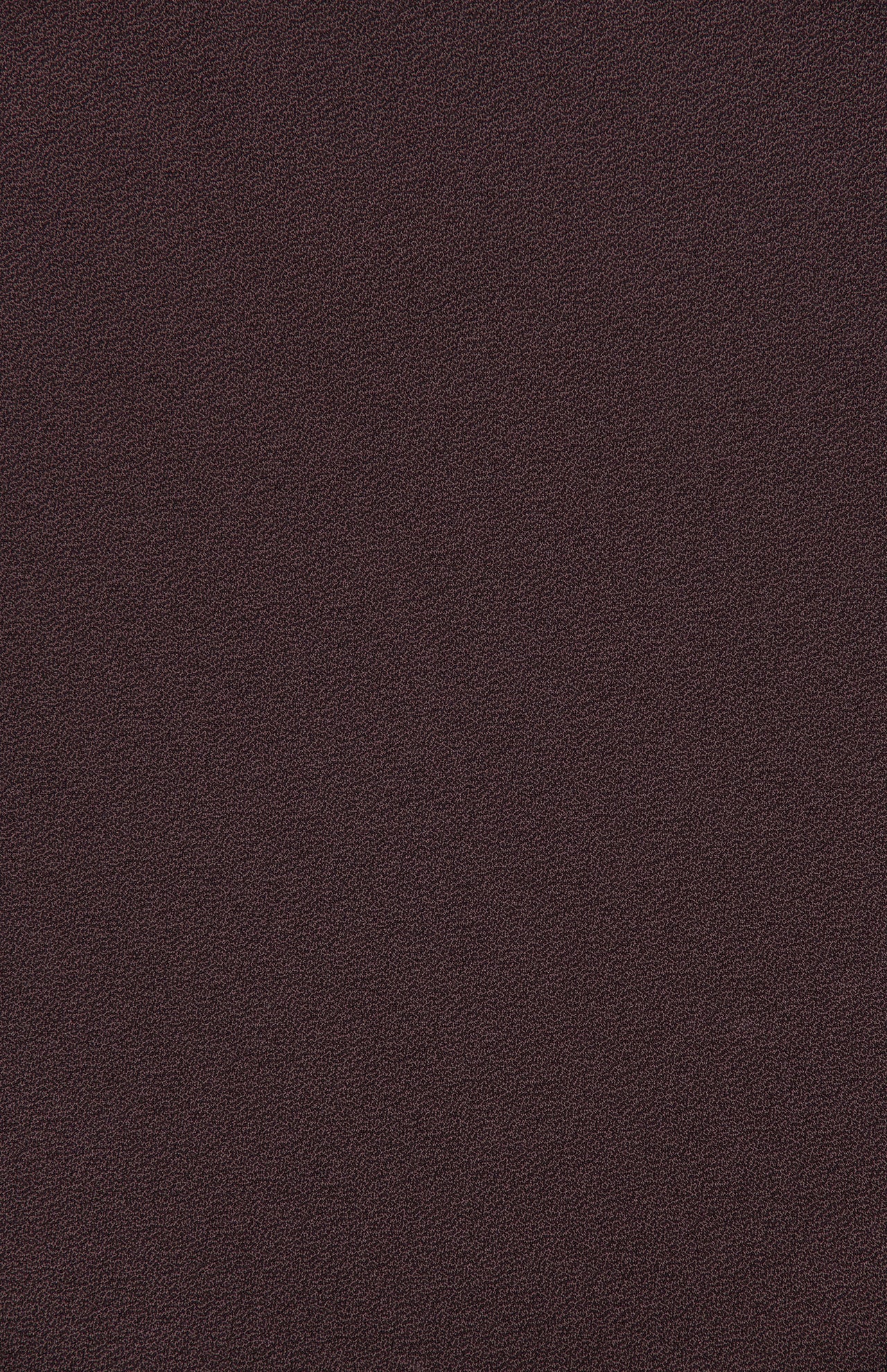 Rich dark brown textured surface with a fine, uniform grain pattern evenly distributed across the entire image, reminiscent of the silky smooth fabric featured in THEORY’s Pebble Scoop Tank Top—an elegant layering piece.