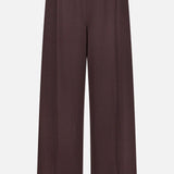The THEORY Pintuck Pull-On Pant is a wide-leg, high-waisted brown pant crafted from silky smooth fabric, featuring an elastic waistband and a relaxed, pull-on design, shown against a plain white background.