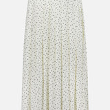 The THEORY Pleated Polka Dot Wrap Skirt is a white, knee-length piece with a flared silhouette and black polka dots—ideal for office wear.