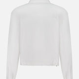 Back view of the THEORY Relaxed Flyer Jacket, a plain white cotton-blend design with collar and elastic cuffs, offering lightweight warmth against a white background.