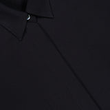 Close-up of the THEORY Short Sleeve Belted A-Line Dress in black, highlighting the refined collar stitching, top button detail, and smooth fabric texture—evoking an air of timeless sophistication.