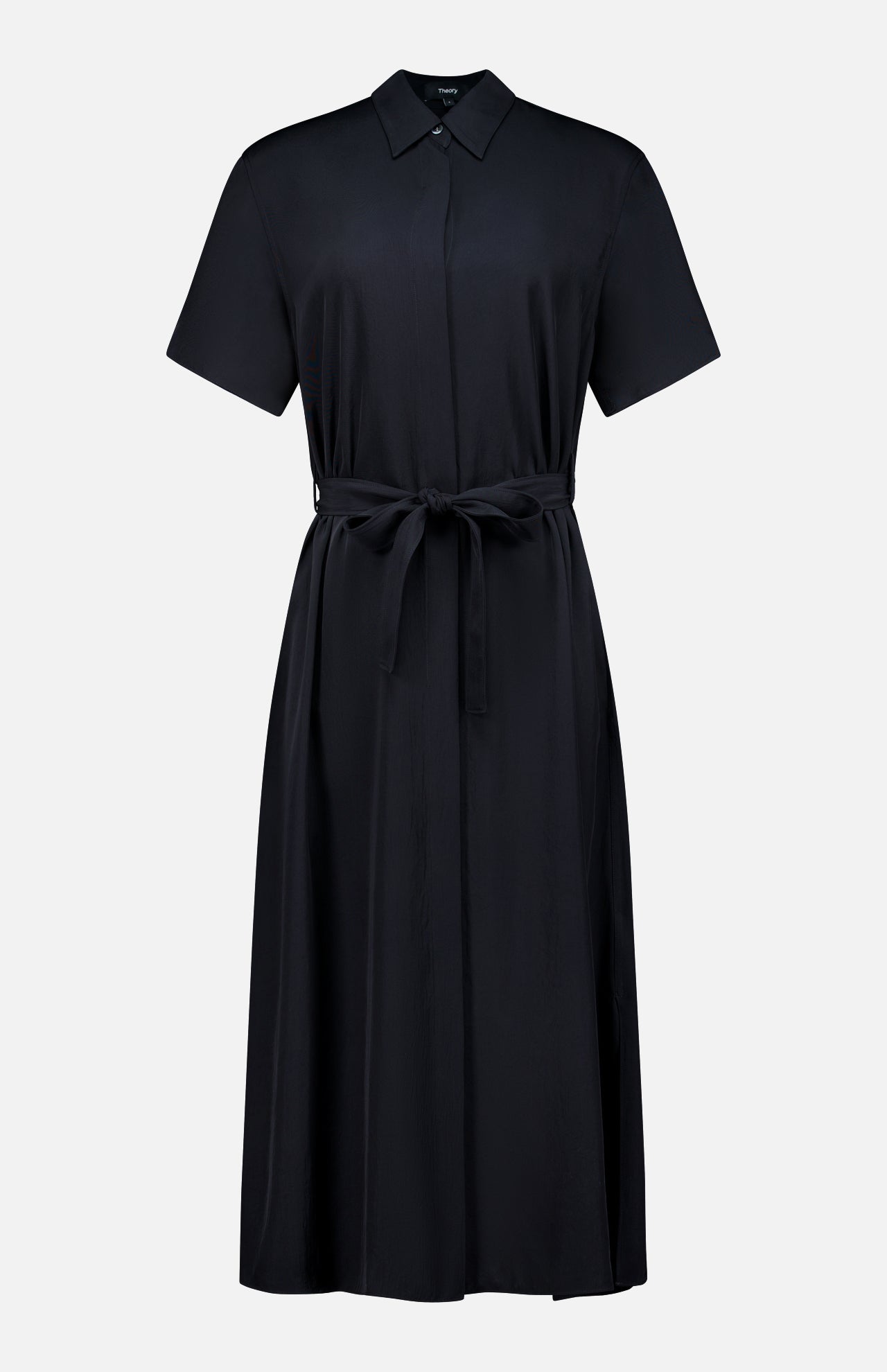THEORY’s Short Sleeve Belted A-Line Dress features a black, collared design with short sleeves and a button-up front. The matching fabric belt ties at the waist for flattering definition, while the gently flared A-line skirt creates an effortlessly chic and timeless silhouette.