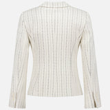 The Shrunken 3 Button Jacket by THEORY features a tailored white design with thin black pinstripes, long sleeves, and three buttons, shown from the back against a plain background.