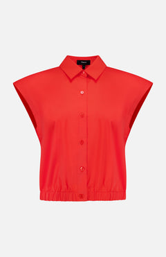THEORY Sleeveless Cropped Elastic Shirt: a bright red, collared button-up top with wide shoulders and elastic hem—ideal for office wear. Shown on a plain white background.