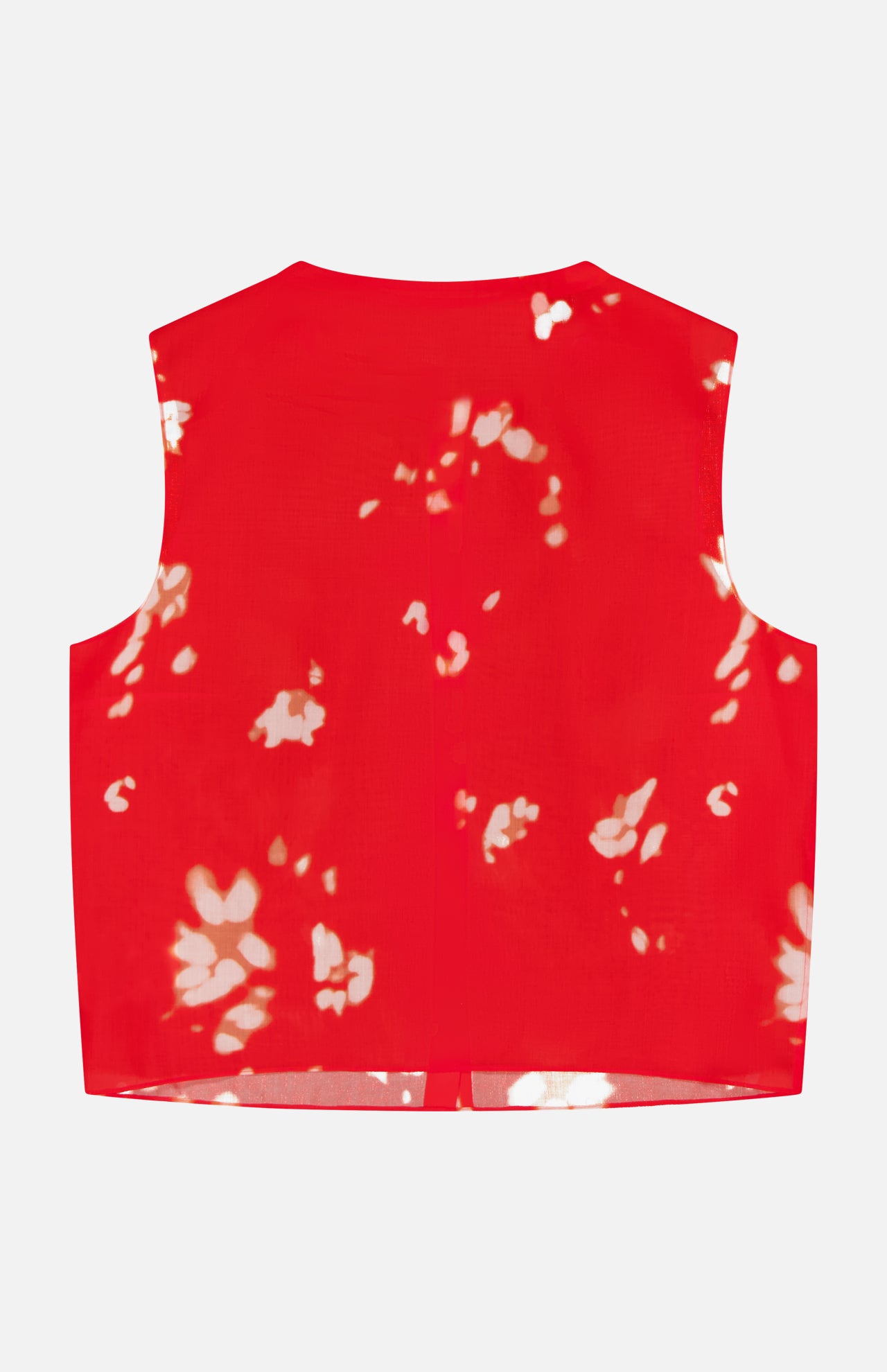 A sleeveless abstract floral shell top by THEORY, shown flat with the back side visible against a simple background—this effortlessly chic piece features a vibrant red and white tie-dye floral pattern, adding a playful twist to any wardrobe.