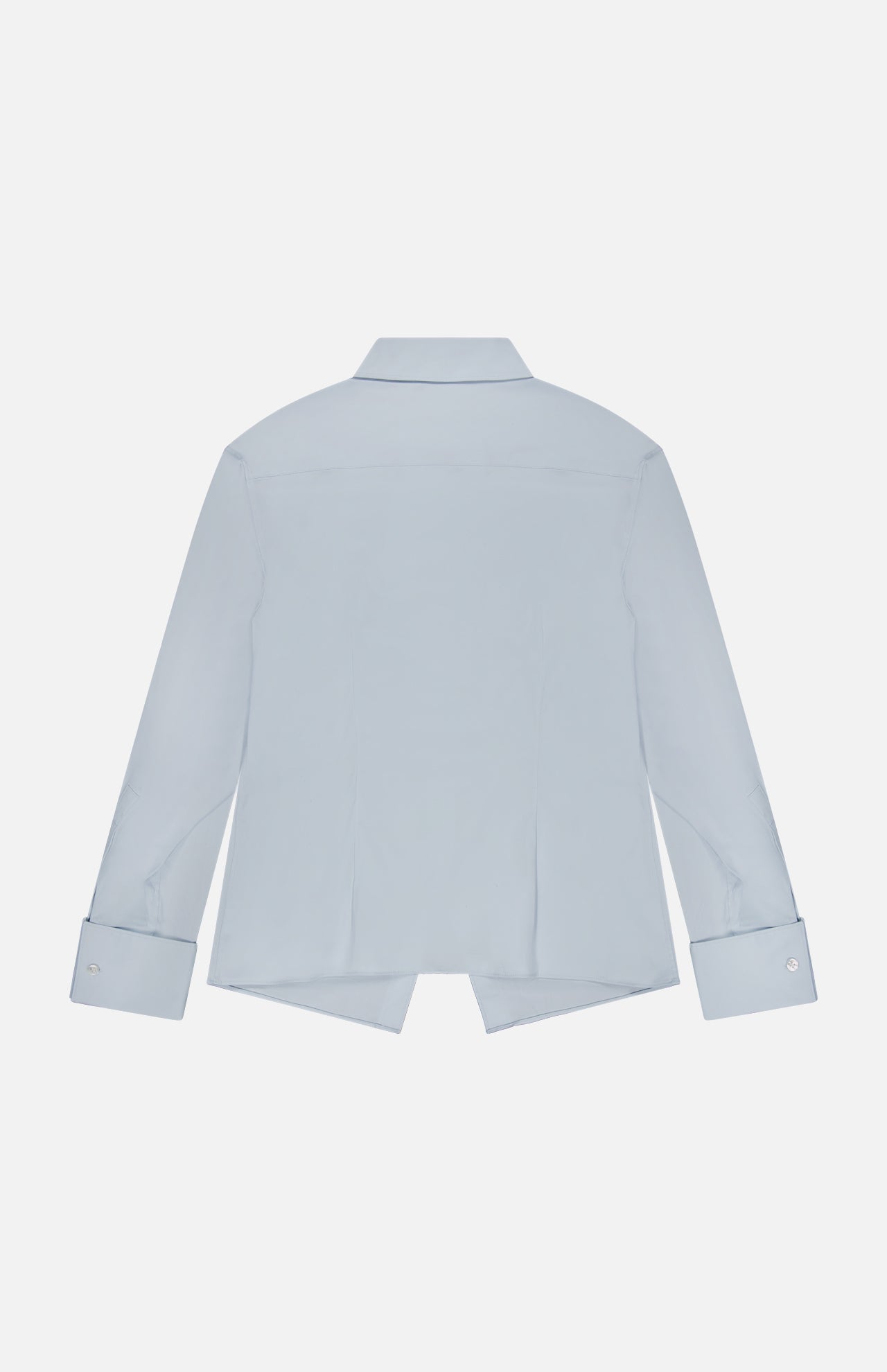 The THEORY Tailored Cutaway Shirt is displayed from the back in light blue, showcasing its long sleeves, slim-fit silhouette, classic collar, buttoned cuffs, and a straight cutaway hem with side slits. This versatile office dress shirt is presented against a plain white background.