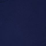 Close-up view of the Tiny Cotton T-shirt by THEORY, crafted from soft Pima cotton in plain navy blue. This style features a crew neckline and a small black brand tag at the collar, while its fitted silhouette elevates its modern look.