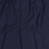 THEORY Wide Cropped Pull-On Pant in dark navy features an elastic waistband, front pleats, and a subtle right zipper pocket. Shown waist-down against a light background, these stylish pants offer easy pull-on construction.