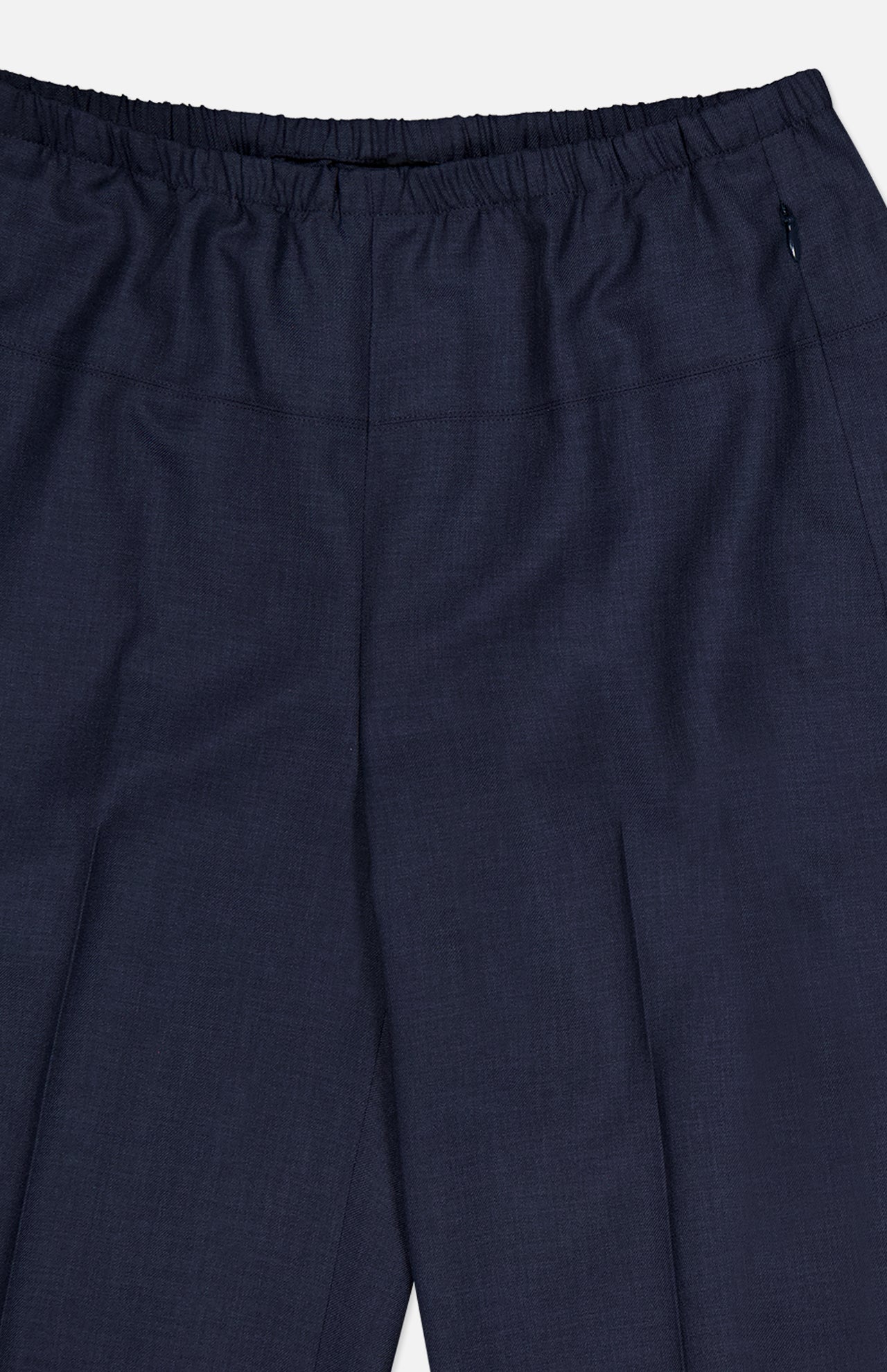 THEORY Wide Cropped Pull-On Pant in dark navy features an elastic waistband, front pleats, and a subtle right zipper pocket. Shown waist-down against a light background, these stylish pants offer easy pull-on construction.