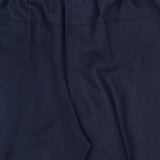 Close-up of the THEORY Wide Cropped Pull-On Pant in dark navy, crafted from lightweight fabric with an elastic waistband and relaxed fit.