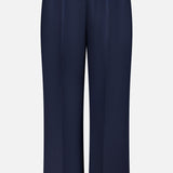 THEORY Wide Cropped Pull-On Pant in dark navy features a relaxed, straight wide-leg fit with an elastic waistband and no visible pockets or embellishments, shown against a plain white background.