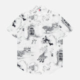 The THOM BROWNE Hector Toile Printed Straight Fit Button Up Shirt is a white cotton poplin top featuring short sleeves and a black and gray surreal toile-style print with scenes of people, animals, buildings, trees, and abstract patterns.