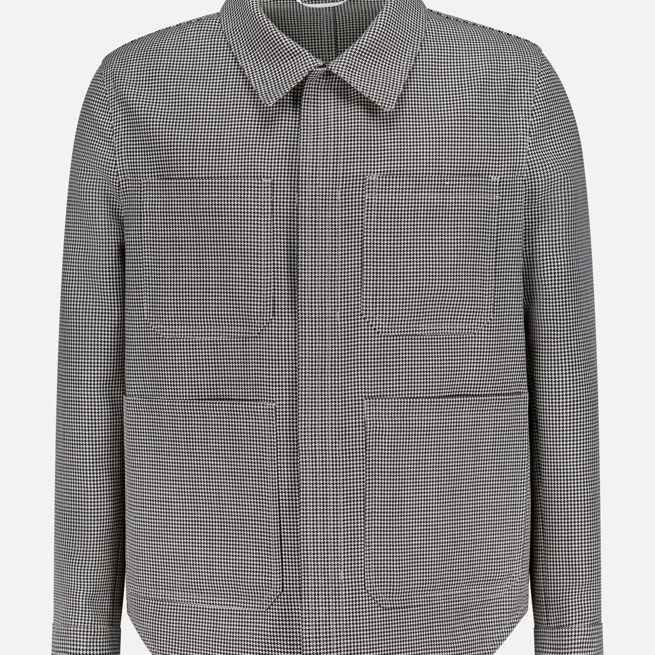 The THOM BROWNE Houndstooth Utility Patch Pocket Jacket features a black and white houndstooth pattern, a collared neckline, concealed front zipper with placket, and two large front pockets, shown on a white background.