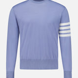 Light blue Fine Merino Wool Classic Crewneck Pullover with four white stripes on the left sleeve.